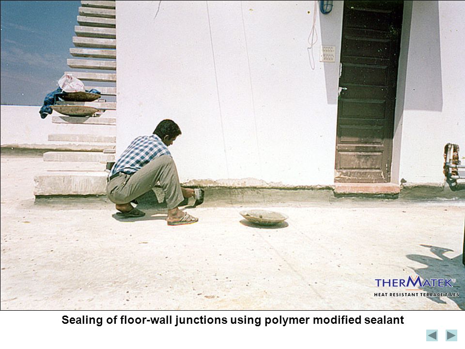 Sealing of floor-wall junctions using polymer modified sealant