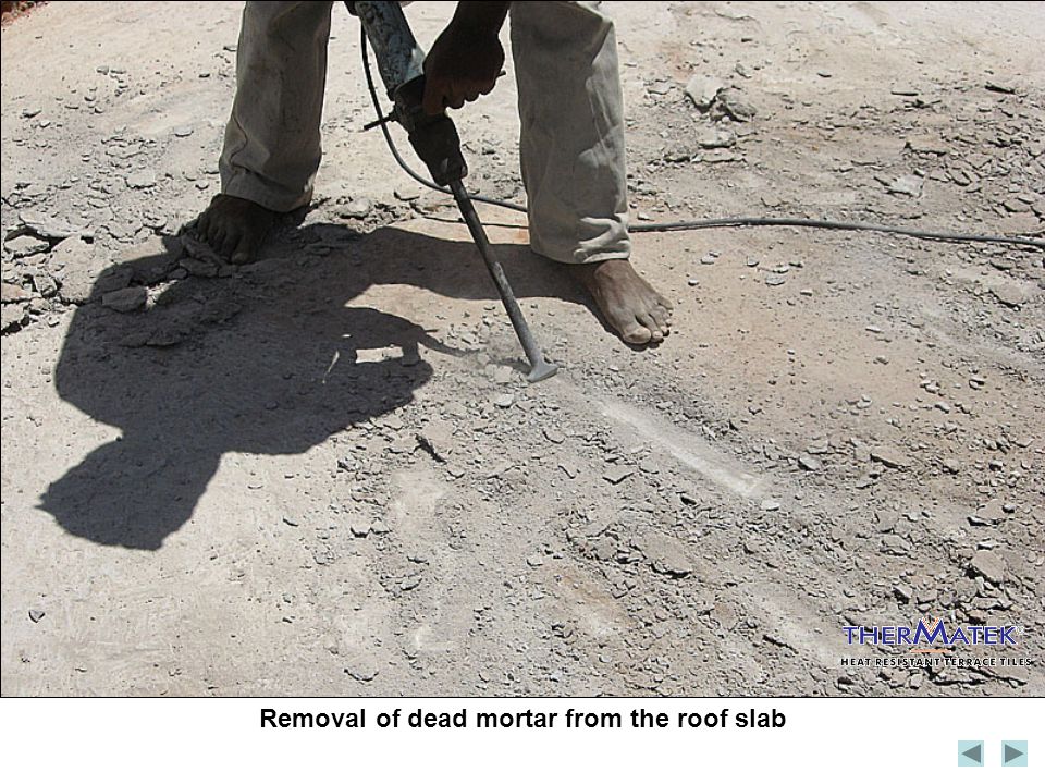 Removal of dead mortar from the roof slab