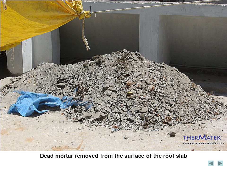 Dead mortar removed from the surface of the roof slab