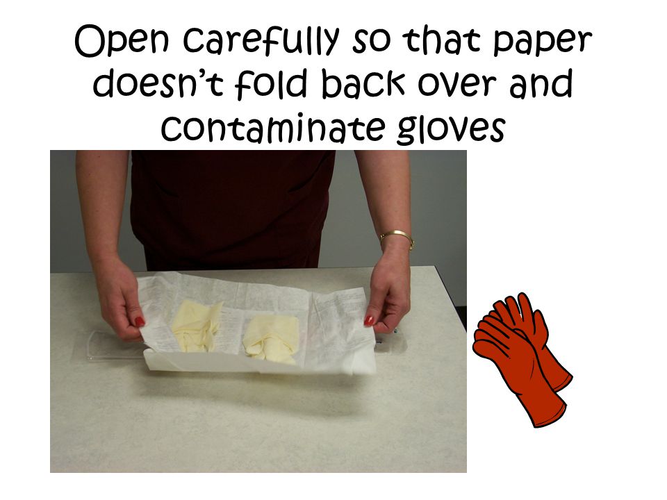 Open carefully so that paper doesnt fold back over and contaminate gloves