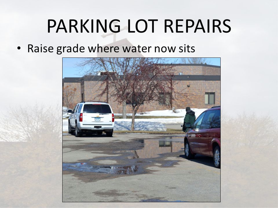 PARKING LOT REPAIRS Raise grade where water now sits