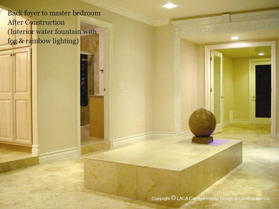Back foyer to master bedroom After Construction (Interior water fountain with fog & rainbow lighting) Copyright © LACA Comfort Interior Design & Construction Co.