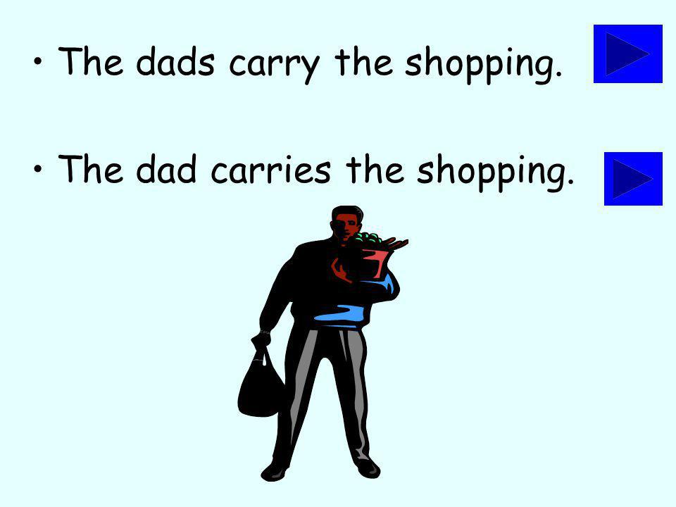 The dads carry the shopping. The dad carries the shopping.