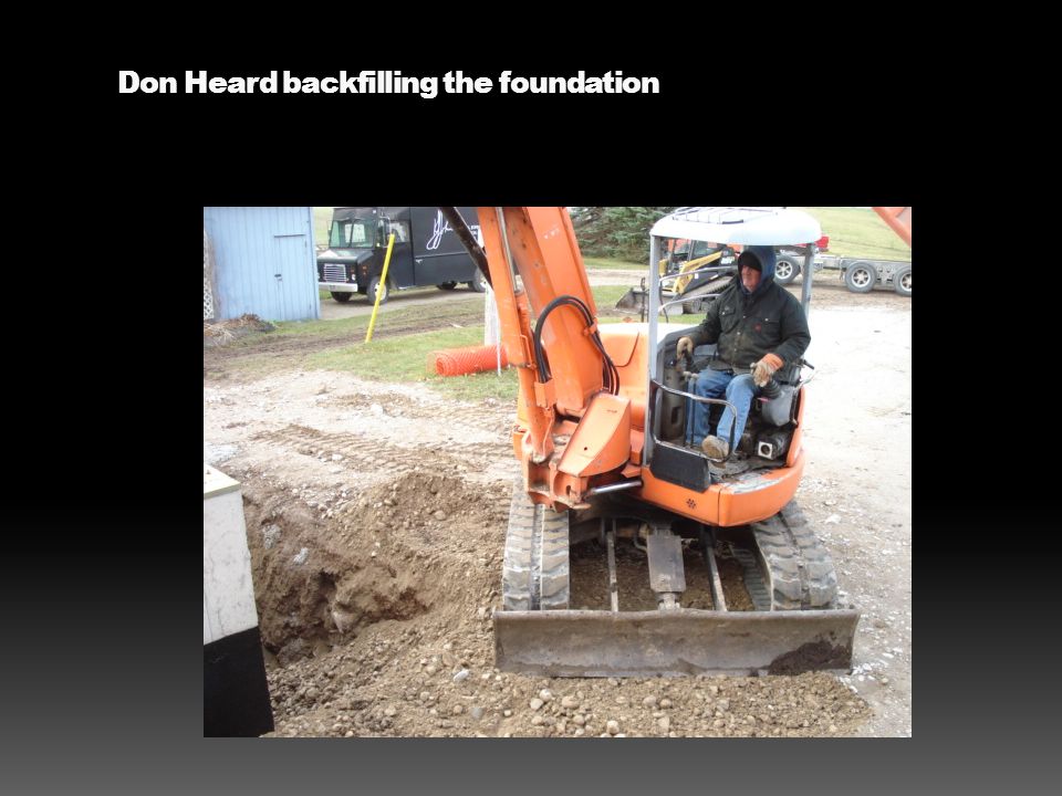 Don Heard backfilling the foundation
