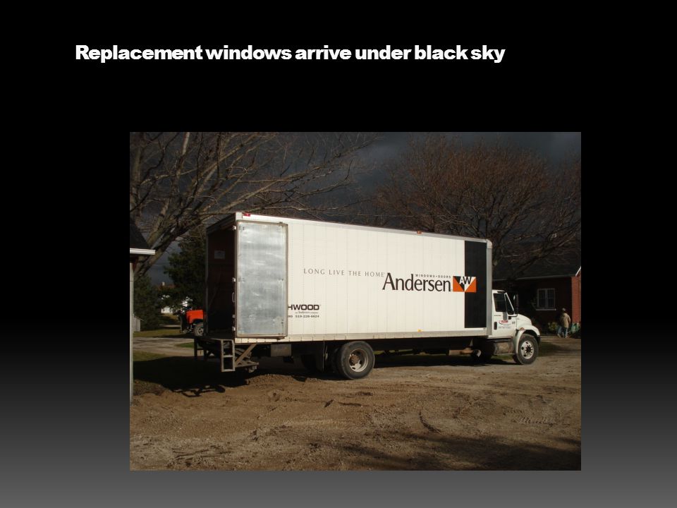 Replacement windows arrive under black sky