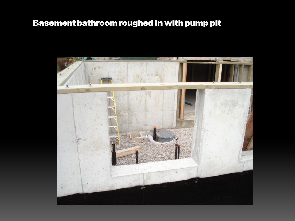 Basement bathroom roughed in with pump pit