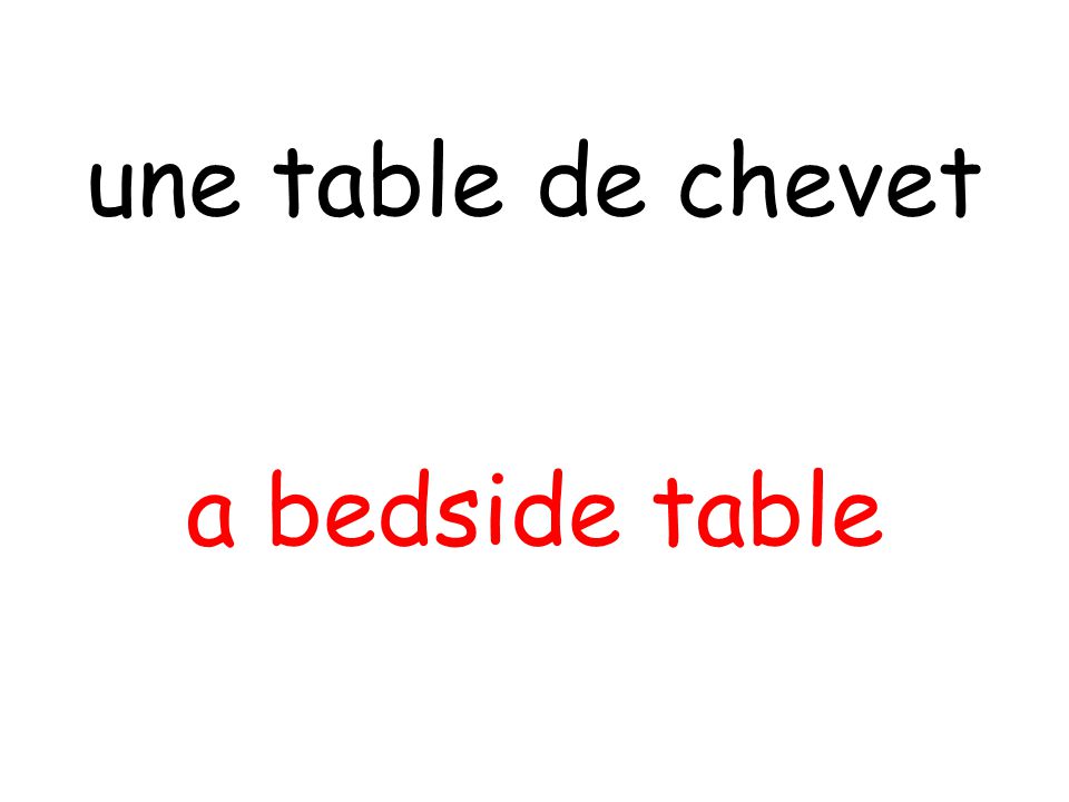 a bedside table une table de chevet