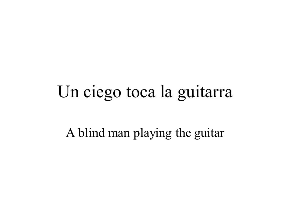 Un ciego toca la guitarra A blind man playing the guitar