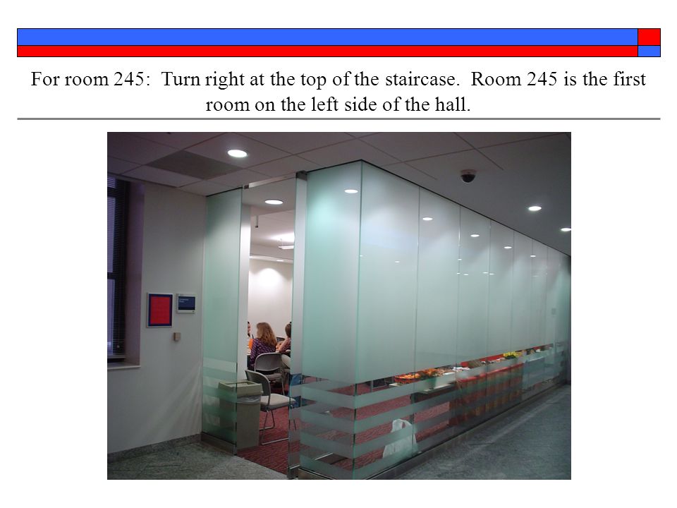 For room 245: Turn right at the top of the staircase.