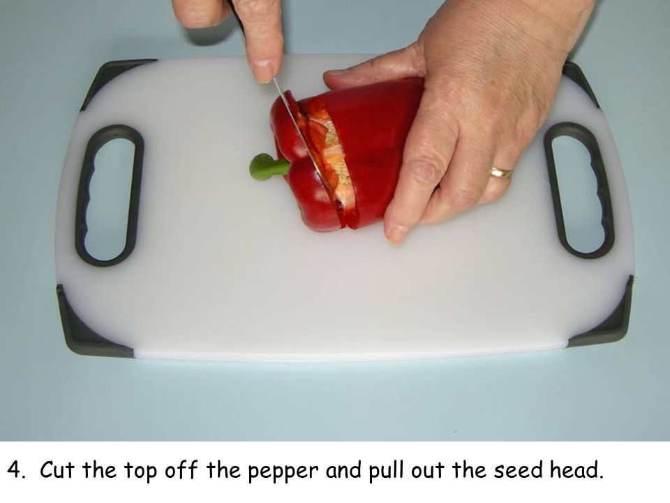 4. Cut the top off the pepper and pull out the seed head.