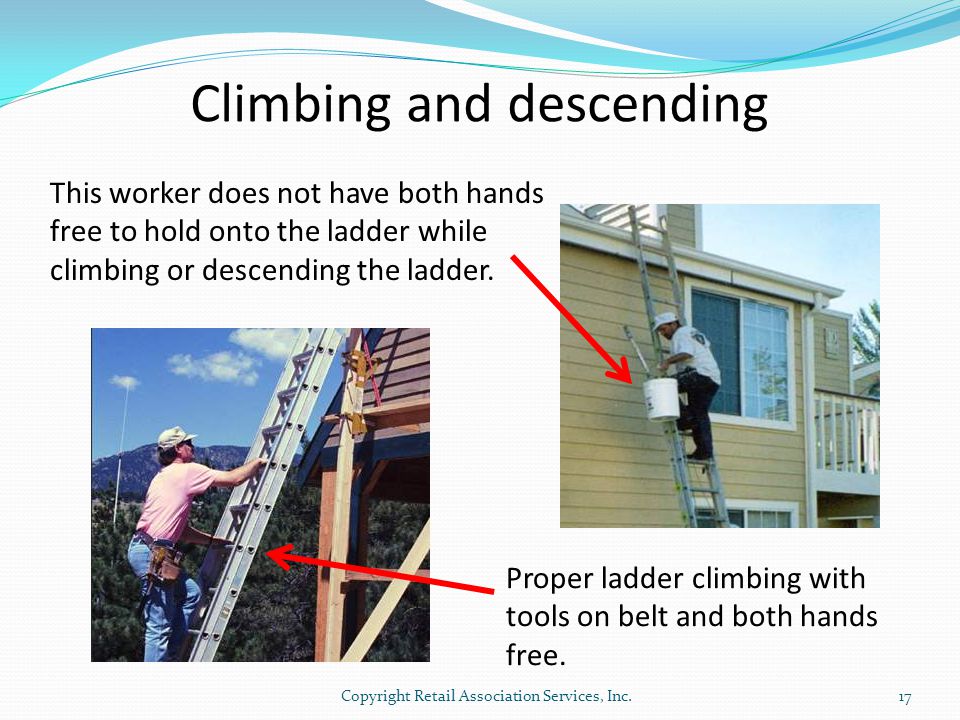 Climbing and descending This worker does not have both hands free to hold onto the ladder while climbing or descending the ladder.