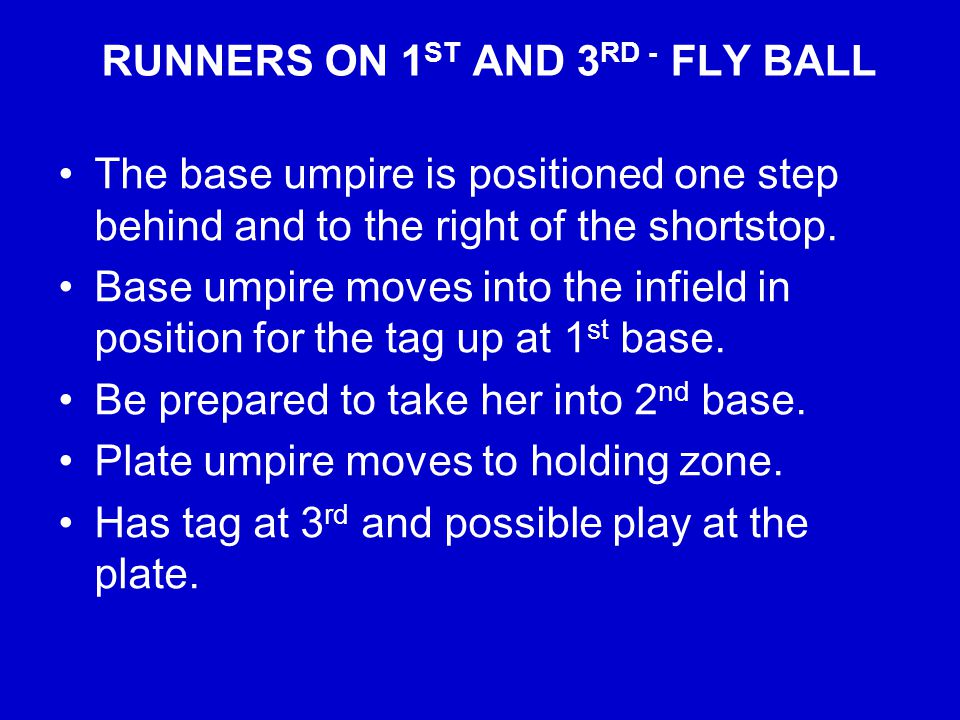 RUNNERS ON 1 ST AND 3 RD - FLY BALL The base umpire is positioned one step behind and to the right of the shortstop.
