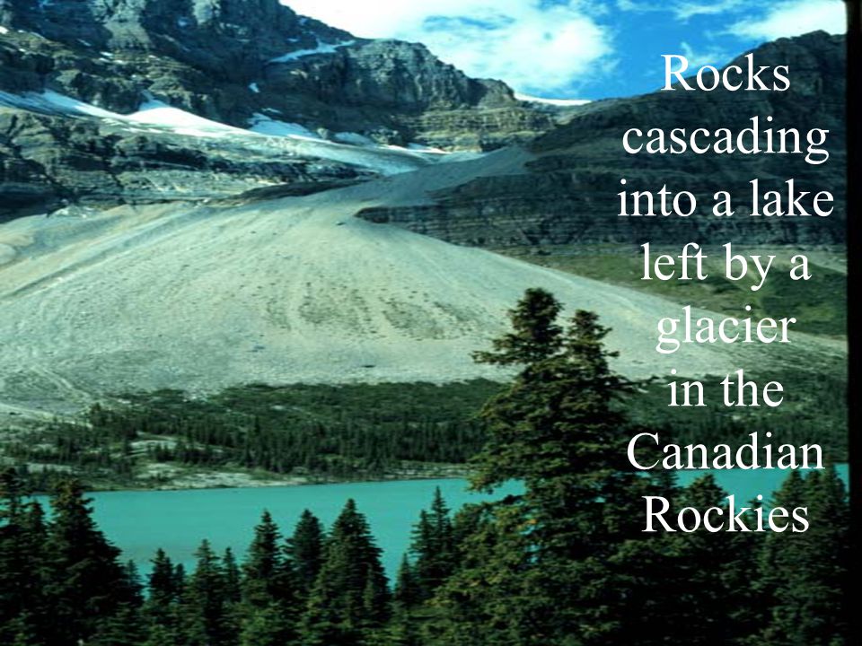 Rocks cascading into a lake left by a glacier in the Canadian Rockies