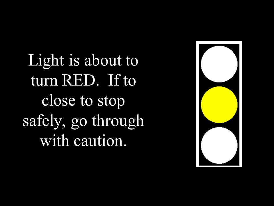 Light is about to turn RED. If to close to stop safely, go through with caution.
