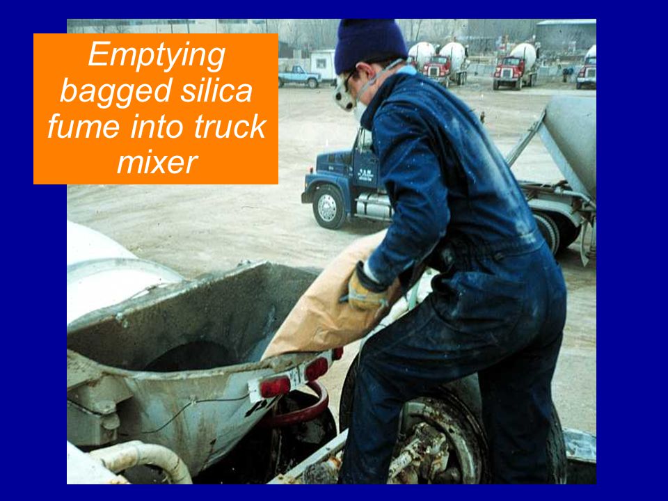 Emptying bagged silica fume into truck mixer
