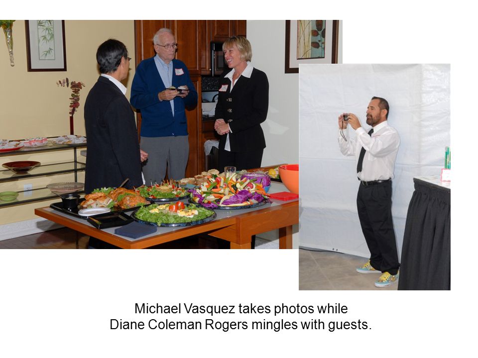 . Michael Vasquez takes photos while Diane Coleman Rogers mingles with guests.
