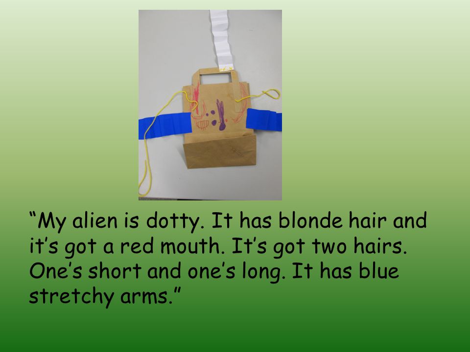 My alien is dotty. It has blonde hair and it’s got a red mouth.
