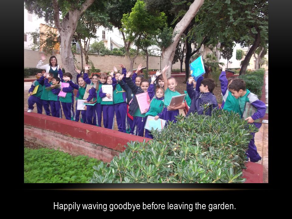 Happily waving goodbye before leaving the garden.