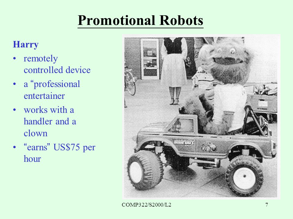 COMP322/S2000/L27 Promotional Robots Harry remotely controlled device a professional entertainer works with a handler and a clown earns US$75 per hour