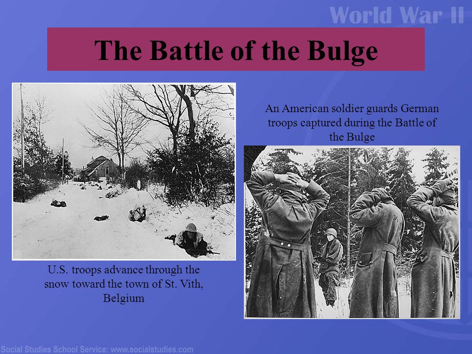 The Battle of the Bulge An American soldier guards German troops captured during the Battle of the Bulge U.S.