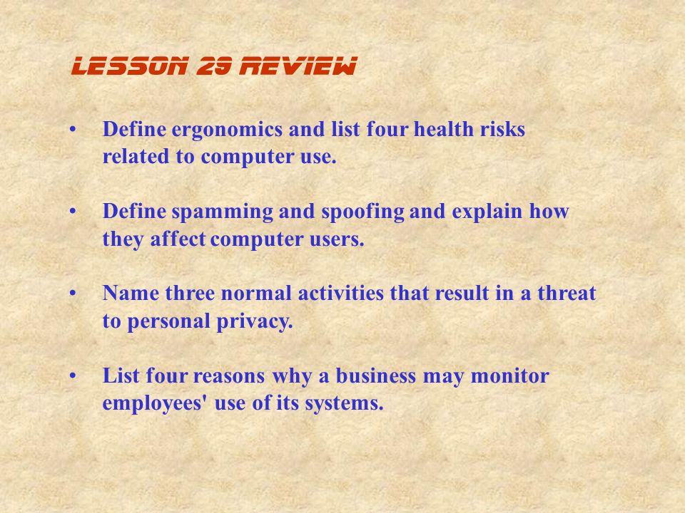 Define ergonomics and list four health risks related to computer use.