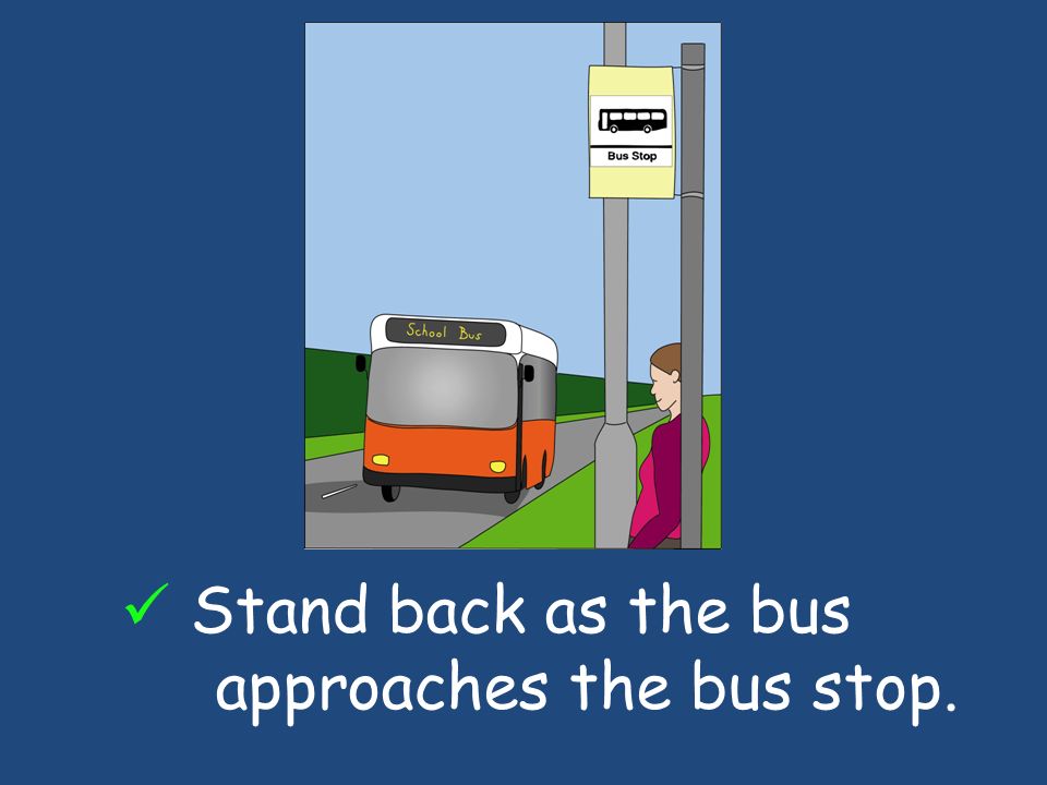 Stand back as the bus approaches the bus stop.