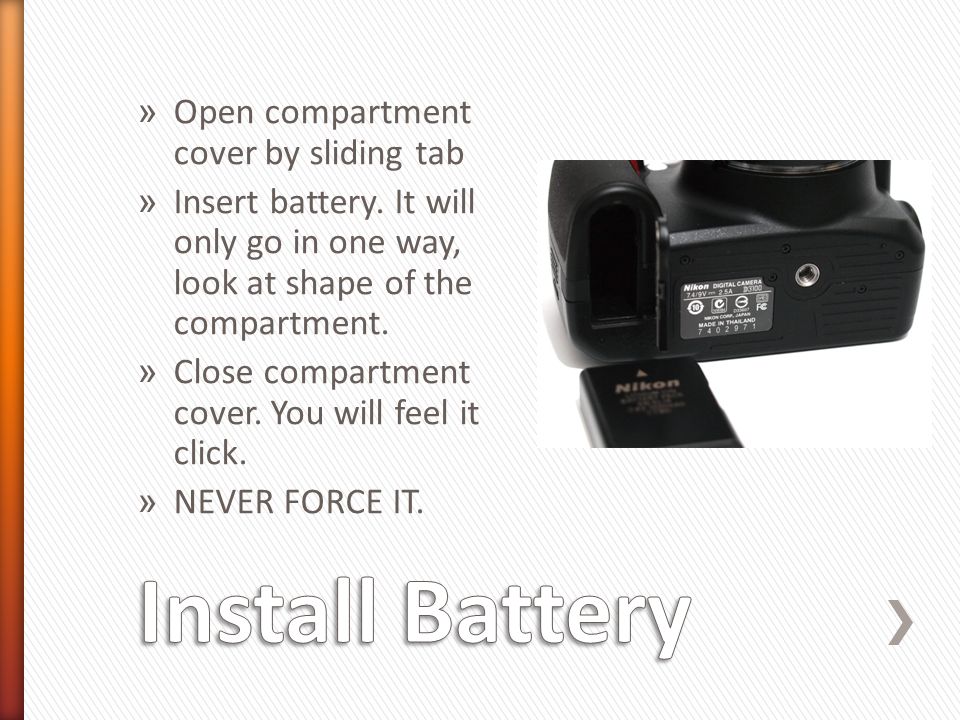 » Open compartment cover by sliding tab » Insert battery.