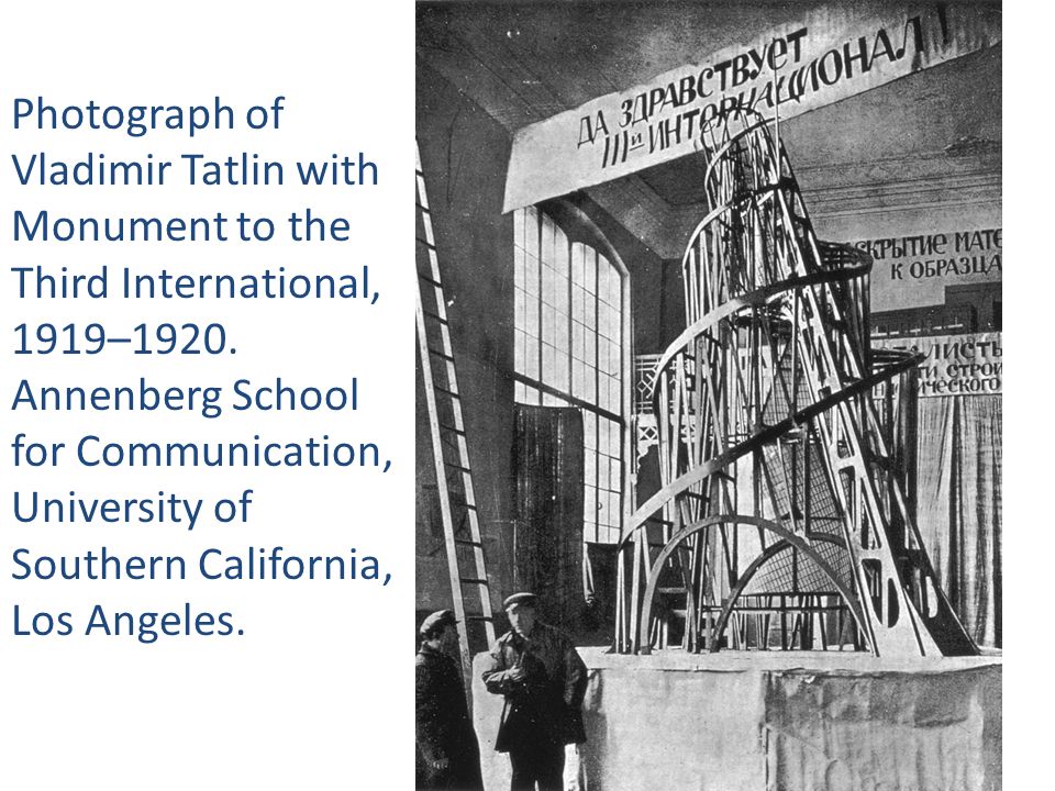 Photograph of Vladimir Tatlin with Monument to the Third International, 1919–1920.