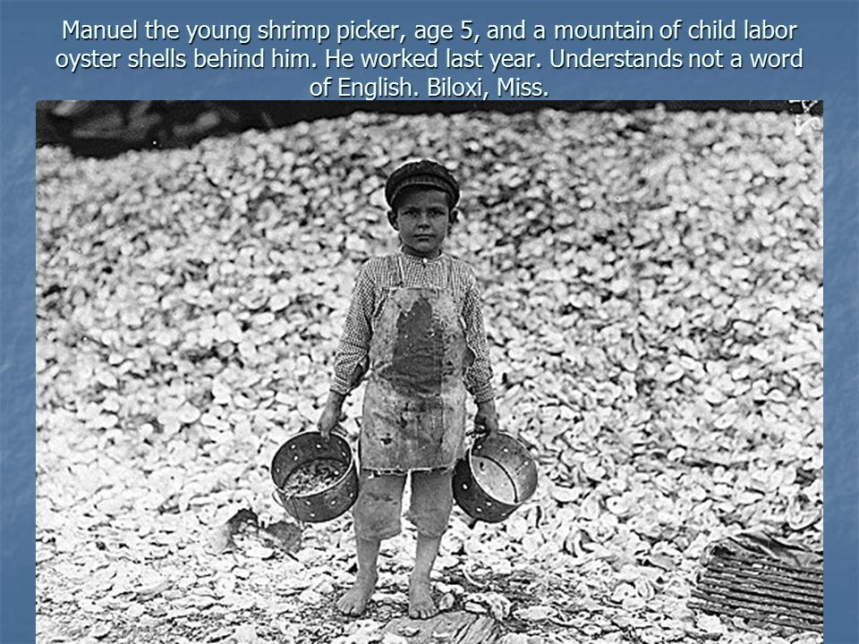 Manuel the young shrimp picker, age 5, and a mountain of child labor oyster shells behind him.