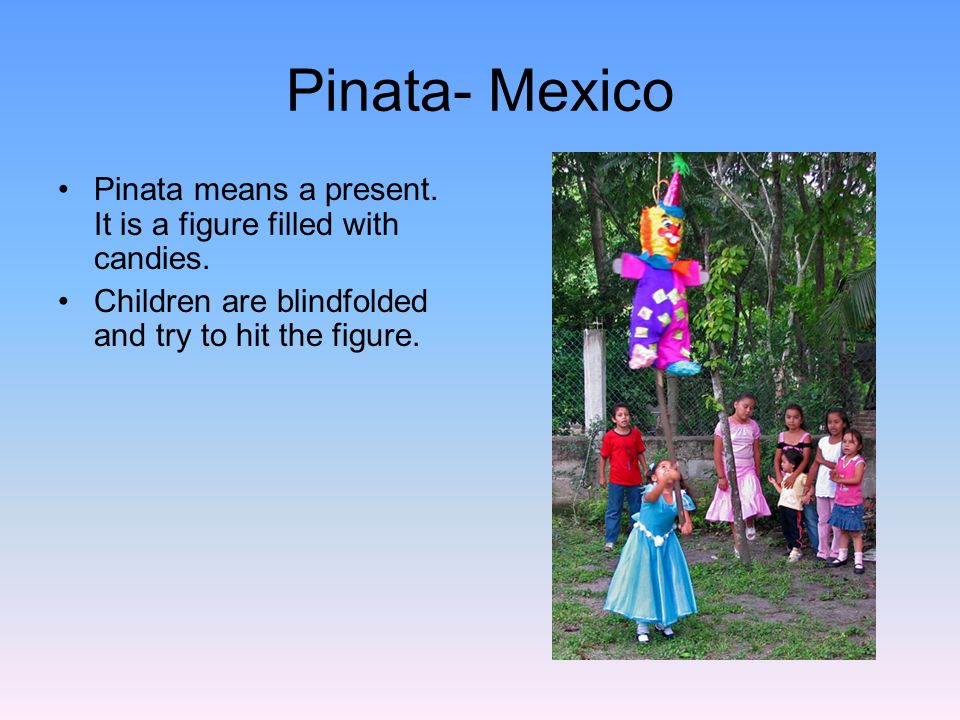 Christmas Around the World Pinata- Mexico Pinata means a present. It is a  figure filled with candies. Children are blindfolded and try to hit the  figure. - ppt download