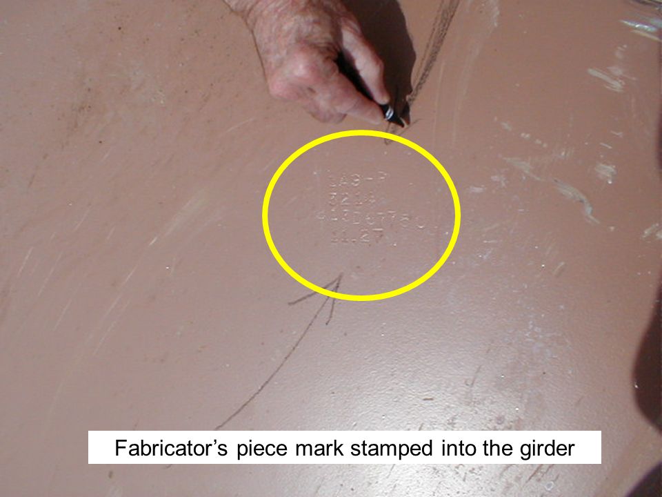 Fabricator’s piece mark stamped into the girder