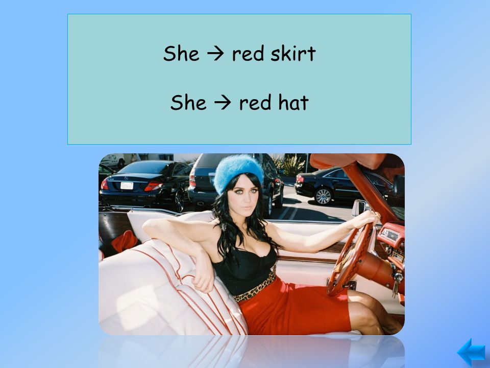 She has a red skirt. She doesn’t have a red hat. She  red skirt She  red hat