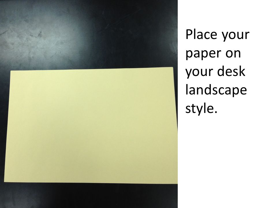 Place your paper on your desk landscape style.