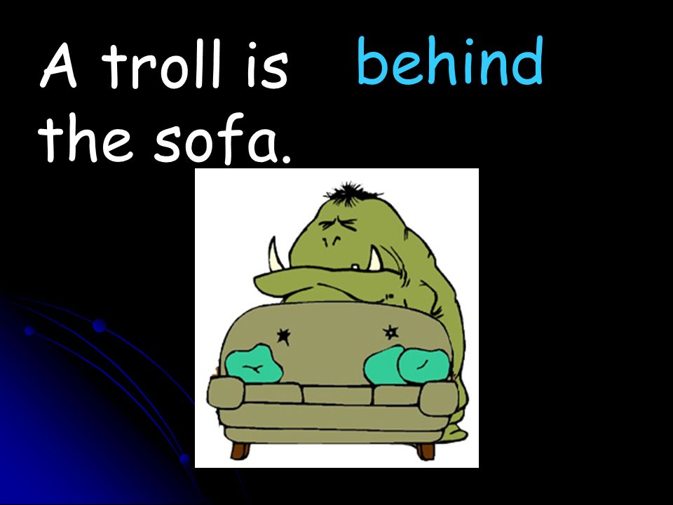 A troll is the sofa. behind