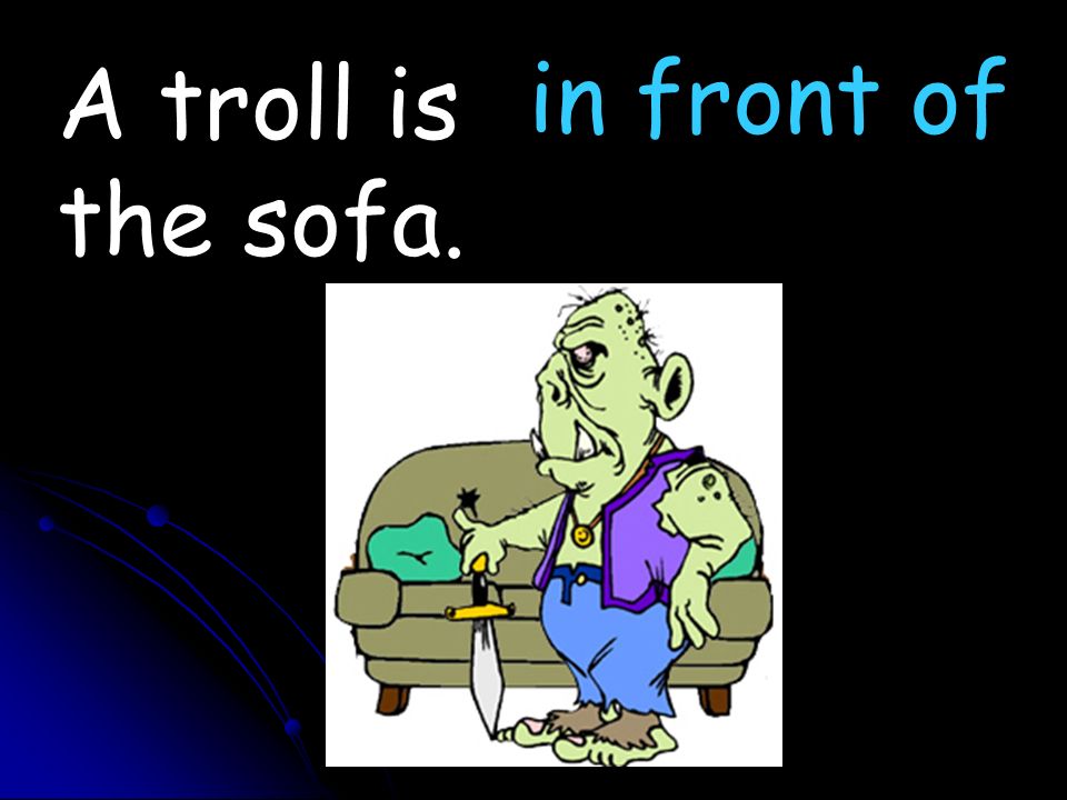 A troll is the sofa. in front of