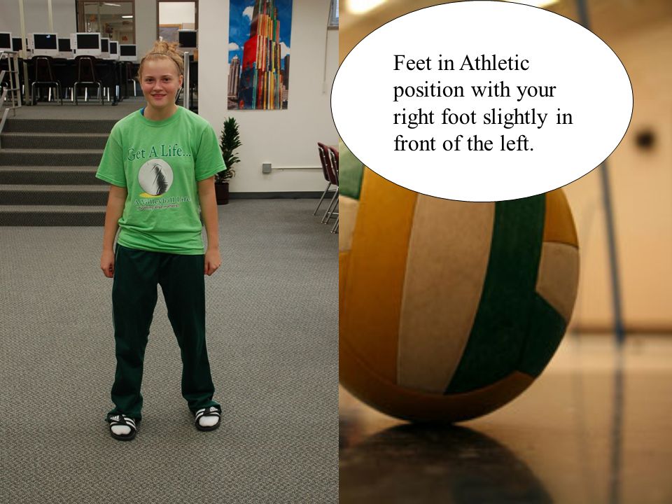 Feet in Athletic position with your right foot slightly in front of the left.