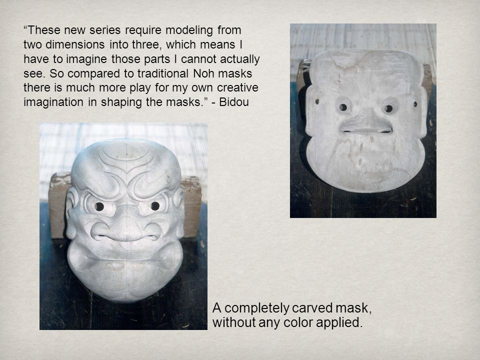A completely carved mask, without any color applied.