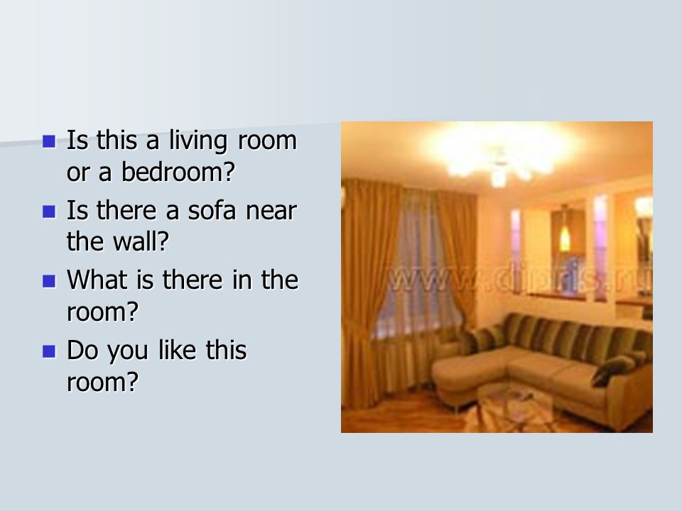 Is this a living room or a bedroom. Is there a sofa near the wall.