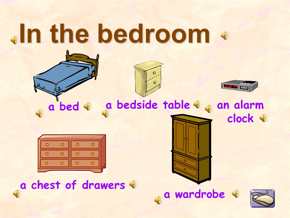 In the bedroom a bed a chest of drawers a bedside table a wardrobe an alarm clock