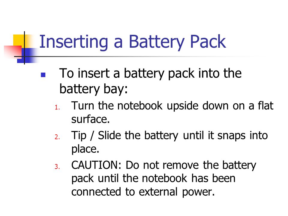 Inserting a Battery Pack To insert a battery pack into the battery bay: 1.