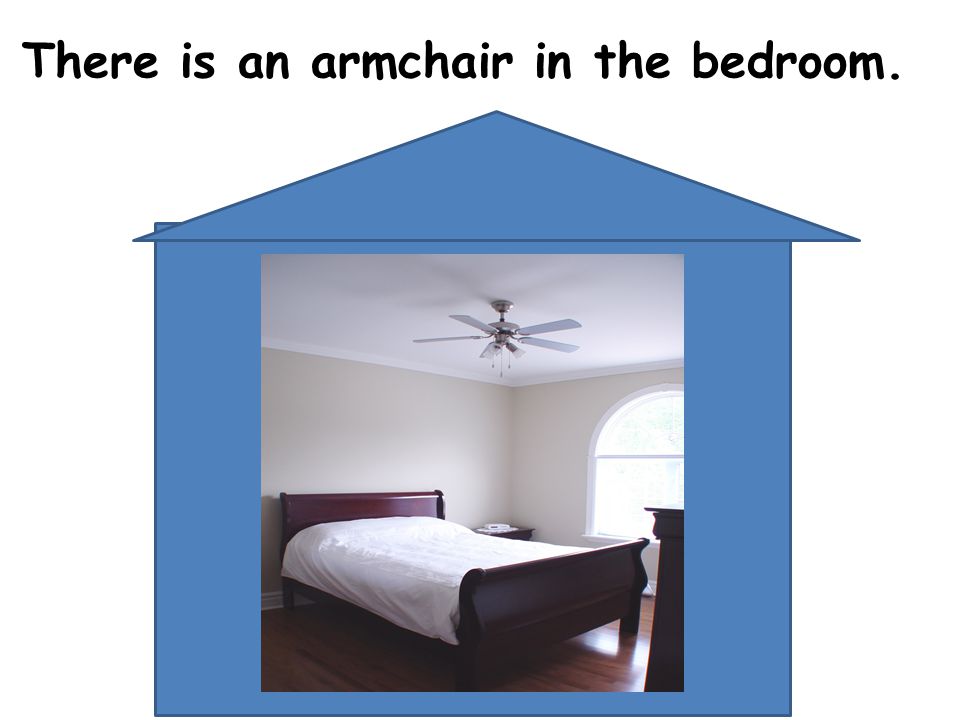 There is an armchair in the bedroom.