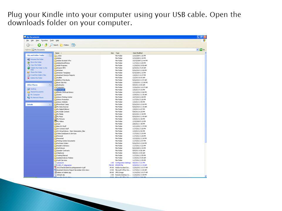 Plug your Kindle into your computer using your USB cable.