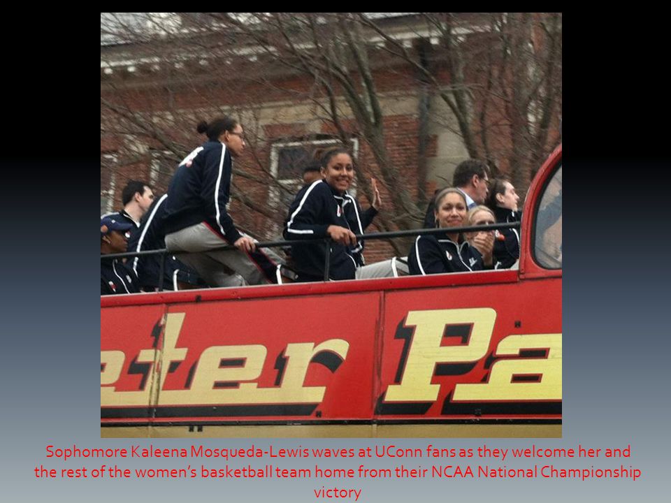 Sophomore Kaleena Mosqueda-Lewis waves at UConn fans as they welcome her and the rest of the women’s basketball team home from their NCAA National Championship victory