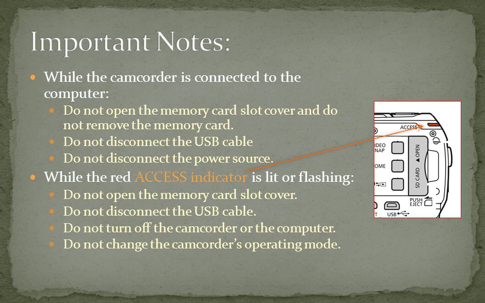 While the camcorder is connected to the computer: Do not open the memory card slot cover and do not remove the memory card.