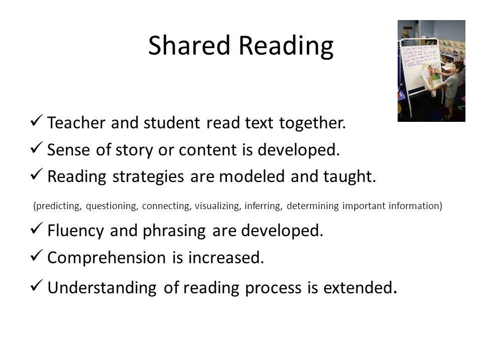 Shared Reading Teacher and student read text together.
